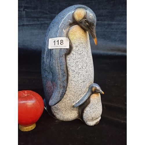 118 - An adorable studio art pottery figure of an Emperor penguin with her baby. In very good condition. T... 