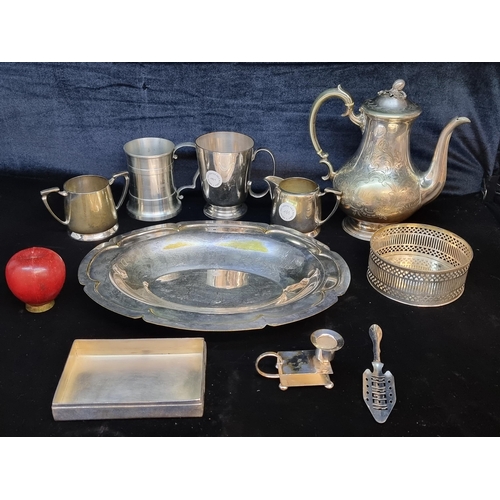 126 - Ten items including silver plated and pewter examples. Comprising of a coffee pot, stein, creamer, s... 