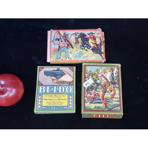 135 - Three vintage c. 1940s/1950s German made pellet toy revolvers with original boxes. From brands Filu,... 