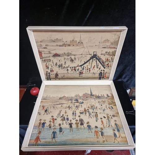 61 - A pair of vintage  prints on board of works by the artist L. S. Lowry, housed in cream wooden frames... 