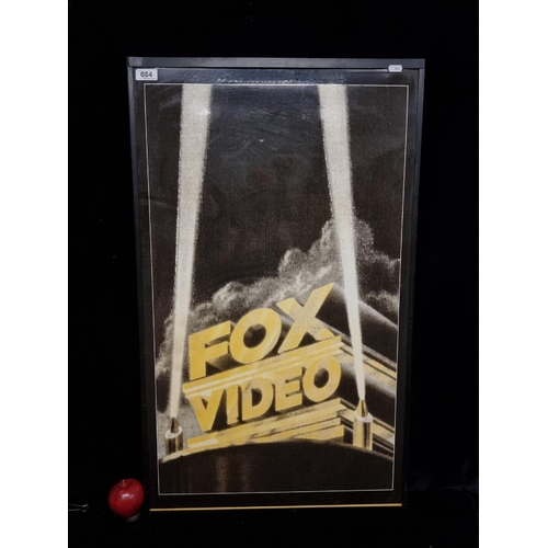 84 - A large vintage print mounted on board showing the 20th century Fox Studios logo. 
MM: 56 x 92 cm in... 