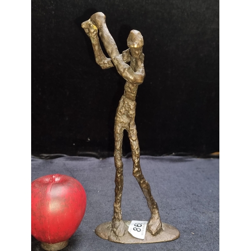 869 - Star Lot : A wonderful heavy abstract cast bronze figure of a golfer mid-swing. Very reminiscent of ... 