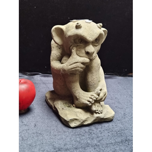 889 - A wonderfully characterful stone sculpture of a mischievous gargoyle. 
MM: H23 cm