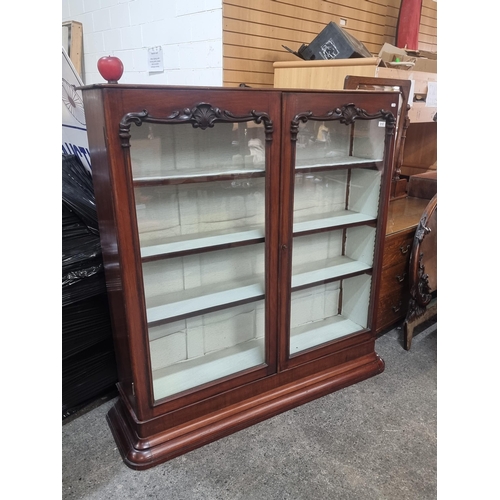 918 - Star lot : A beautiful Victorian display cabinet with three shelves and glass doors featuring intric... 