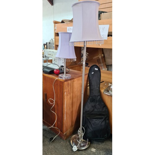 939 - Two charming matching lamps including a floor standing and a table example. Both with chrome bases a... 