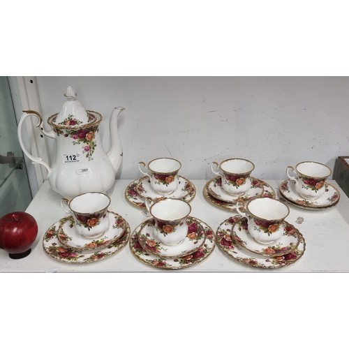 112 - Eighteen pieces of Royal Albert tea service in The Old Country Roses pattern. Comprising of a coffee... 