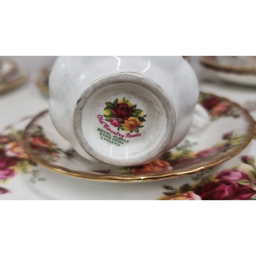 112 - Eighteen pieces of Royal Albert tea service in The Old Country Roses pattern. Comprising of a coffee... 