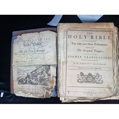 123 - Three hardback books including an antique 1782 edition of The Holy Bible published in Dublin contain... 