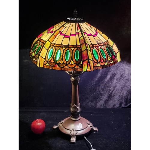 937 - A beautiful Tiffany style tale lamp with an intricate colourful glass shade. Fitted with a three-pro... 