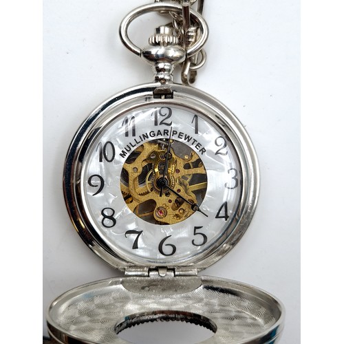 7 - A Mullingar Pewter half hunter pocket watch, featuring an inspection aperture to front and reverse. ... 