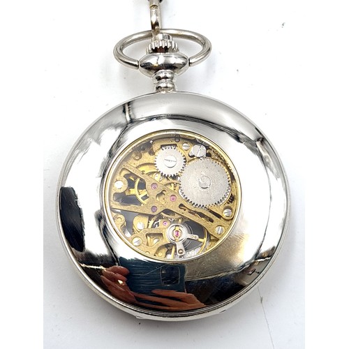 7 - A Mullingar Pewter half hunter pocket watch, featuring an inspection aperture to front and reverse. ... 