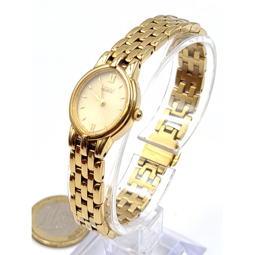 8 - An elegant example of a Citizen gold toned ladies wrist watch, featuring an oval white enamelled fac... 