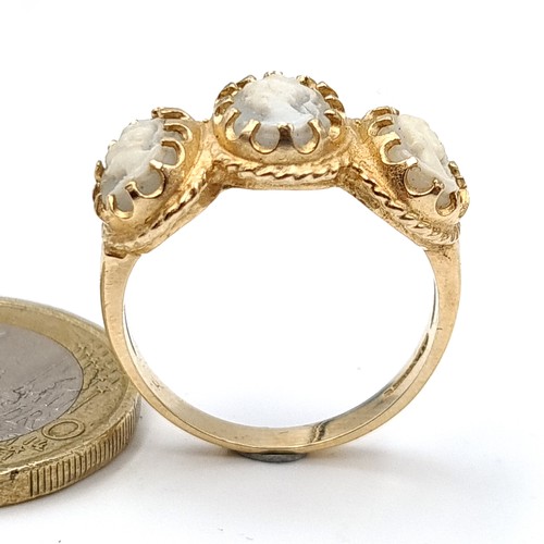 51 - Star Lot : A fabulous and unusual antique 9 carat gold (stamped 375) three stone Cameo ring. Ring si... 