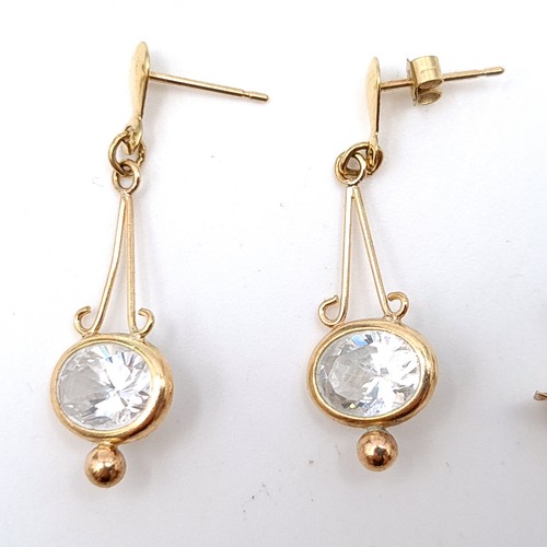 57 - A collection of six pairs of 9 carat gold stud earrings, including a beautiful pair set with White S... 