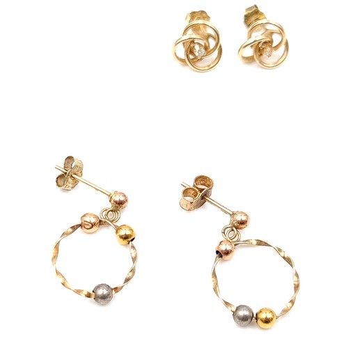 57 - A collection of six pairs of 9 carat gold stud earrings, including a beautiful pair set with White S... 