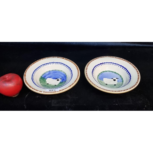 148 - Two charming Nicholas Mosse bowls featuring a sheep design. With very small hairlines to base but ov... 