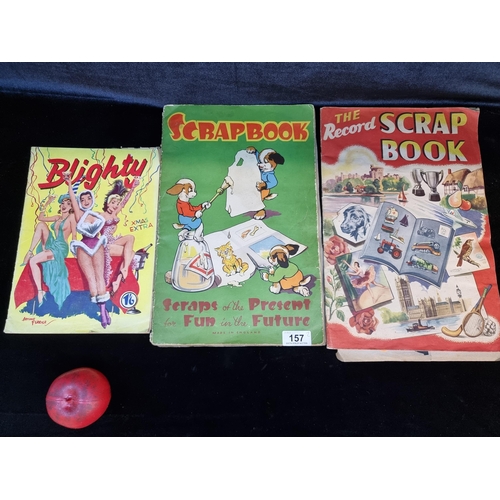 157 - Three vintage items including two scrapbooks featuring various advertisements and colourful illustra... 