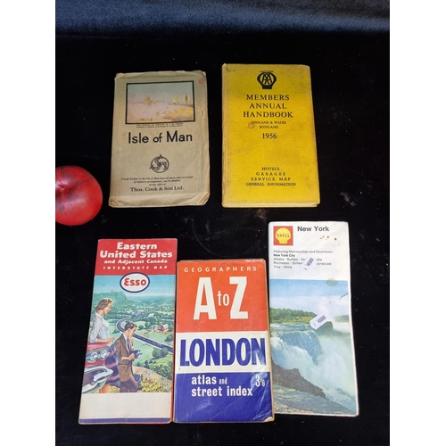 176 - Five vintage publications including a 1956 AA Members annual handbook, a vintage Isle of Man travel ... 