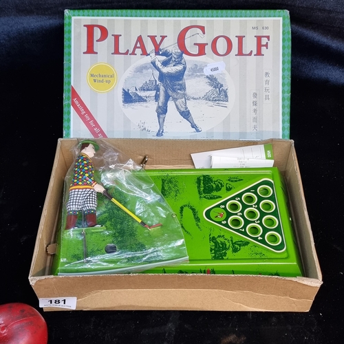 181 - A fantastic vintage table top tin plate Play Golf game from Ha Ha Toy Factory. With a wind up key, g... 