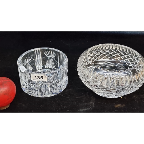 185 - Two crystal items including a Waterford Crystal wine bottle coaster in the Millennium pattern. Along... 