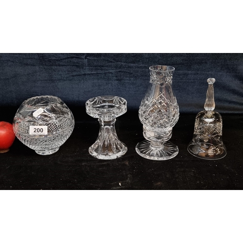 200 - Four crystal items including a Waterford Crystal Marquis candle holder, round centrepiece bowl, hurr... 