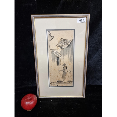 82 - An original ink wash on paper painting featuring a figure carrying goods down a street. Signed botto... 