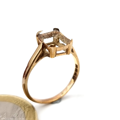 22 - A 9 carat gold ring setting. Ring size N. Weight 1.75 grams