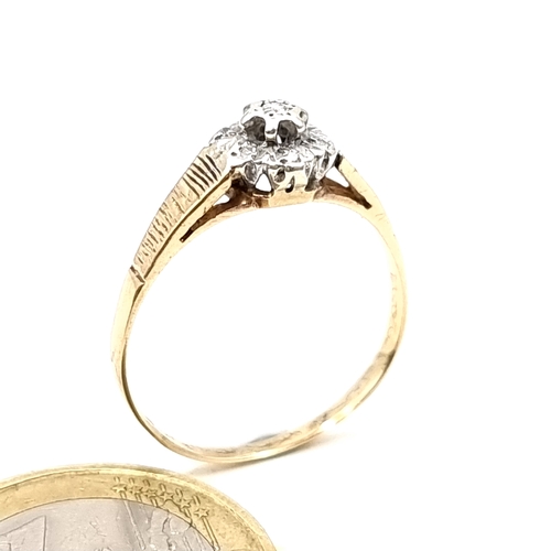 3 - An illusion set diamond ring in 9 carat gold with channel cut shoulders. Ring size Q. Weight 1.8g.