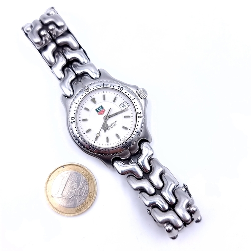 60 - Star Lot : A Genuine Tag Heuer Professional wrist watch. Watch No. WG1212-KO. Set with baton dial, s... 