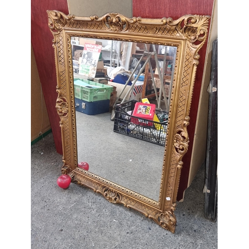 804 - A beautiful large over mantle mirror housed in a gilt gold frame.
H88cm X W68cm