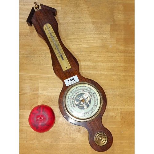 798 - A wall mounting barometer with thermometer to top. Made in West Germany.