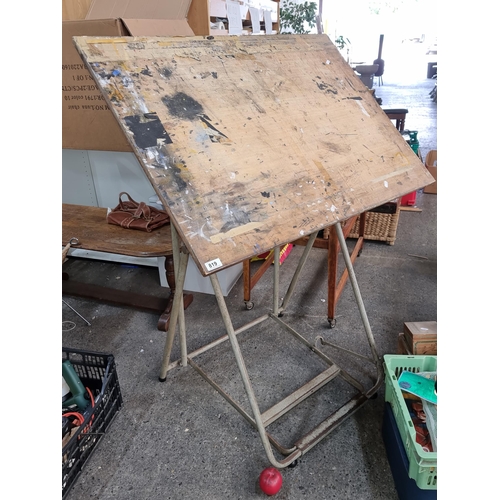 819 - A large vintage  professional artists easel with stainless steel frame.