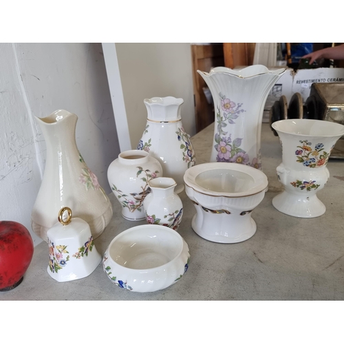 848 - Nine ceramic items including vases from Belleek, Royal Tara and more.