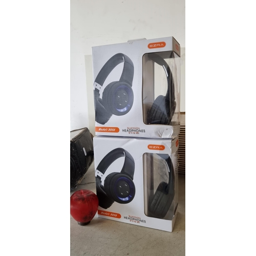 850 - Two brand new pairs of Ezra Bluetooth headphones model 9956. With original boxes and unopened.