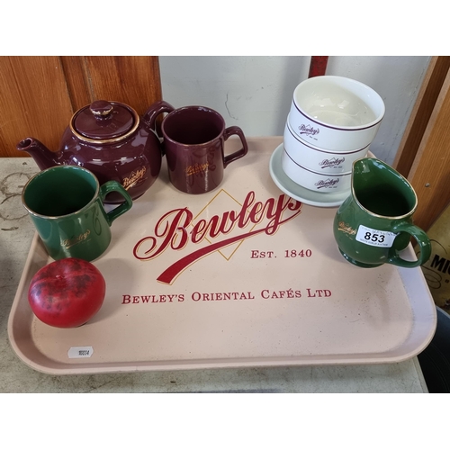 853 - Nine Bewley's advertising items including two mugs, a creamer, teapot, three bowls from Carrigaline ... 