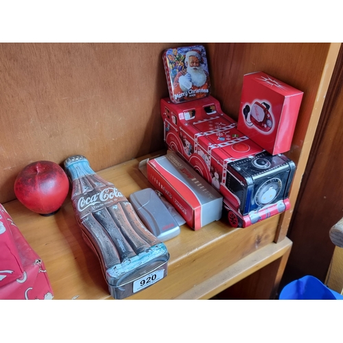 920 - A lot of five vintage Coca Cola collectible items including a mini-radio and a portable mobile phone... 