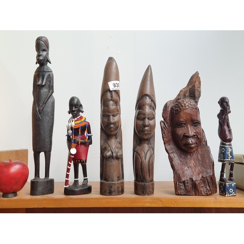 930 - A collection of six wooden African tribal figures.