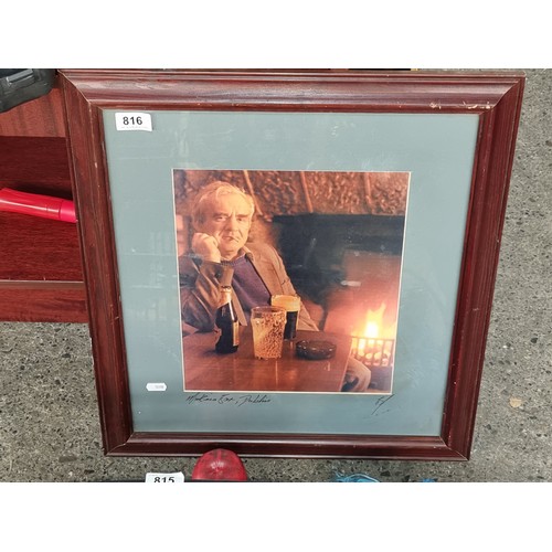 816 - A photograph portrait titled indistinctly 'Mickies Bar, Dublin' depicting a man smoking in a bar. Si... 