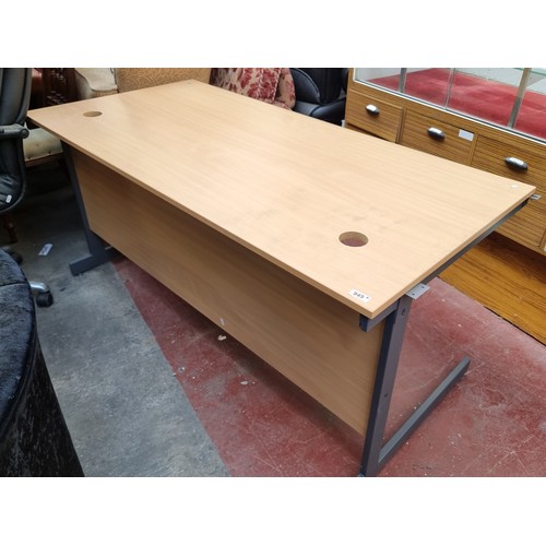 945 - Two office desks with metal supports and cable ports. H73cm x L153cm x W75cm