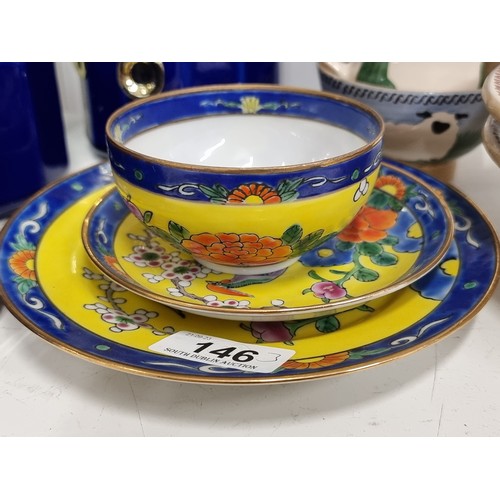 146 - Three vintage Chinese famille rose fine porcelain items including a teacup, saucer and side plate. I... 