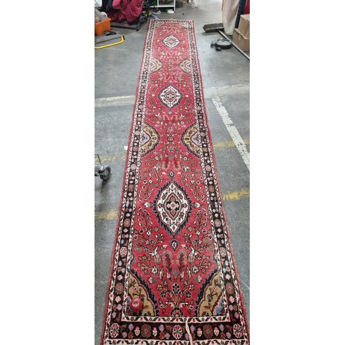 904 - Star Lot: A gorgeous Persian hand knotted wool and cotton hall runner rug from the Sarouck province.... 