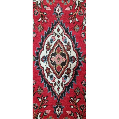 904 - Star Lot: A gorgeous Persian hand knotted wool and cotton hall runner rug from the Sarouck province.... 