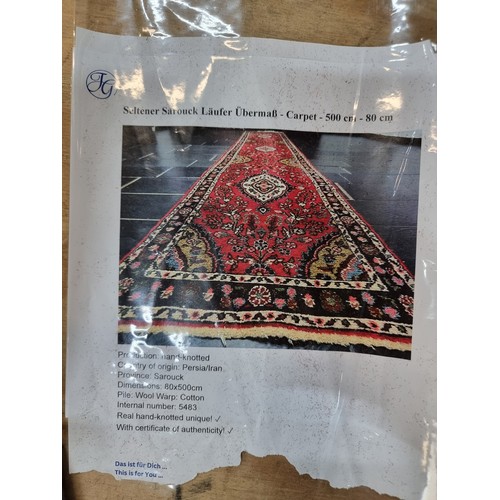 904 - Star Lot: A gorgeous Persian hand knotted wool and cotton hall runner rug from the Sarouck province.... 