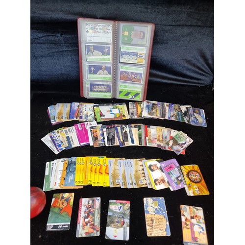 168 - A large selection of phone cards including mainly Irish examples and other worldwide examples. Comes... 