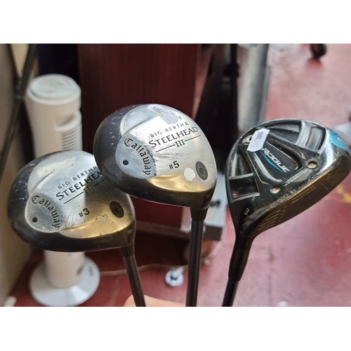 890 - A selection of three graphite shaft Callaway woods including a Big Berta 3 and 5 wood, along with a ... 