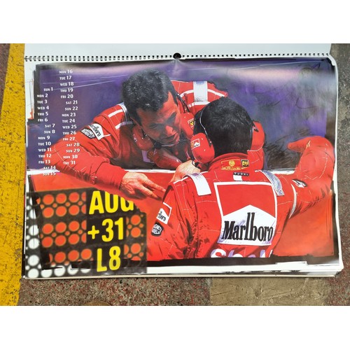 922 - A large retro Ferrari calendar from the year 1999 with fabulous images throughout.