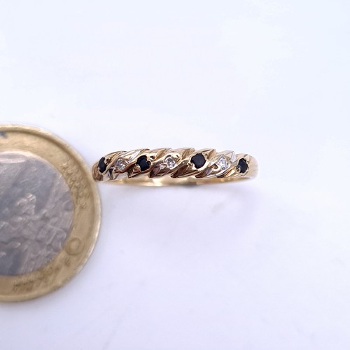 1 - Star Lot : A very pretty 9 carat gold diamond and sapphire ring. Ring size O. Weight 1.36g.