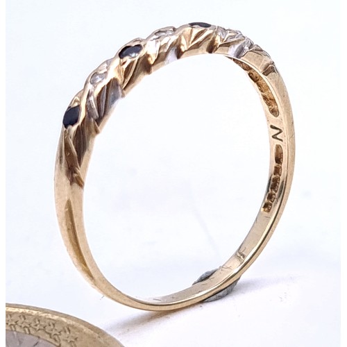 1 - Star Lot : A very pretty 9 carat gold diamond and sapphire ring. Ring size O. Weight 1.36g.