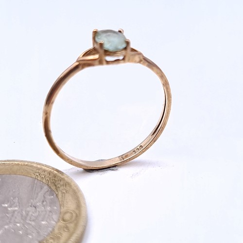 45 - Star Lot : A Beautiful vintage aquamarine stone 9 carat gold ring. Ring size O.