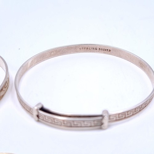 47 - Three sterling silver infant identity bracelets, with a total weight of 13.62 grams.